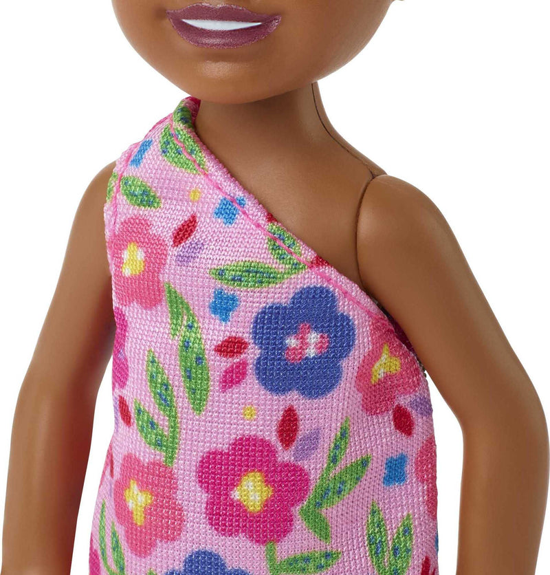 Barbie Chelsea Doll (Brunette Curly Hair) Wearing One-Shoulder Flower-Print Dress and Pink Shoes,