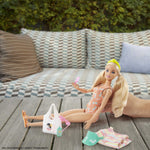 Barbie Storytelling Fashion Pack of Doll Clothes Inspired by Roxy: Striped Dress, Roxy Swimsuit & 7 Beach-Themed Accessories Dolls Including Frozen Treat